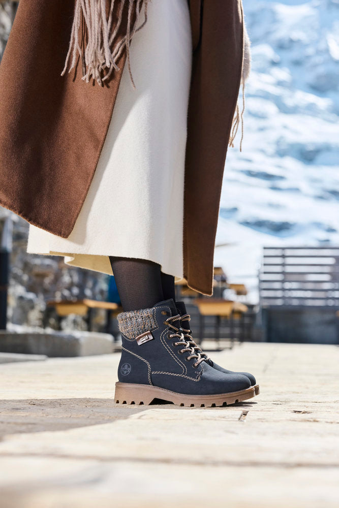 Rieker 73220-14 women's navy/grey water resistant zip & lace ankle boots, lifestyle view 7 of 8.