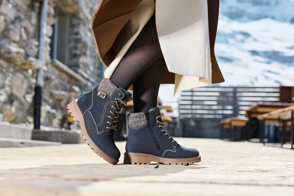 Rieker 73220-14 women's navy/grey water resistant zip & lace ankle boots, lifestyle view 8 of 8.