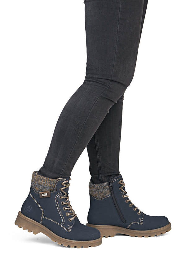 Rieker 73220-14 women's navy/grey water resistant zip & lace ankle boots, on-foot lifestyle view.