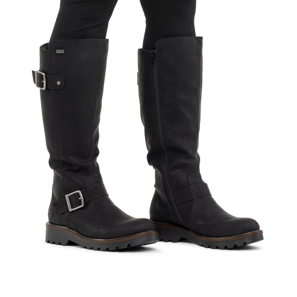Rieker 73292-00 women's black water resistant side zip mid-calf boots, on-foot lifestyle view.