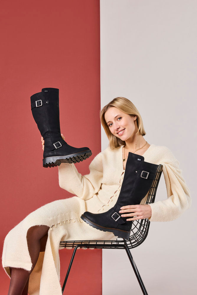 Rieker 73292-00 women's black water resistant side zip mid-calf boots, lifestyle view 5 of 17.