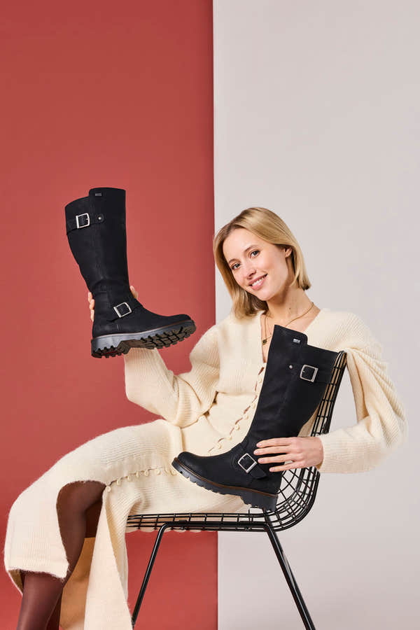 Rieker 73292-00 women's black water resistant side zip mid-calf boots, lifestyle view 5 of 17.