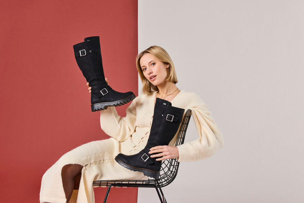 Rieker 73292-00 women's black water resistant side zip mid-calf boots, lifestyle view 6 of 17.