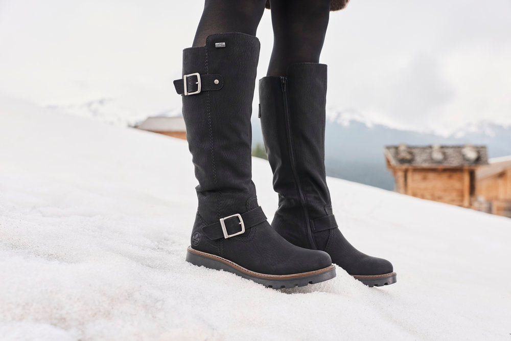 Rieker 73292-00 women's black water resistant side zip mid-calf boots, lifestyle view 13 of 17.