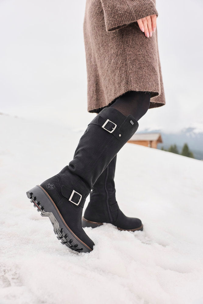 Rieker 73292-00 women's black water resistant side zip mid-calf boots, lifestyle view 14 of 17.