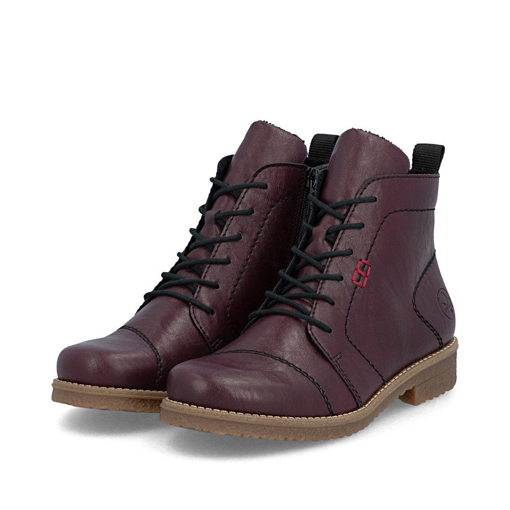 Rieker 73500-30 women's burgundy zip & lace ankle boots, paired three-quarter view.