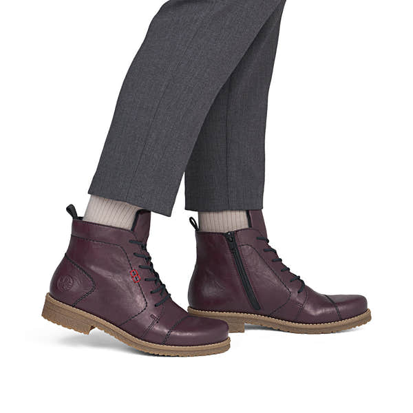 Rieker 73500-30 women's burgundy zip & lace ankle boots, on-foot lifestyle view.