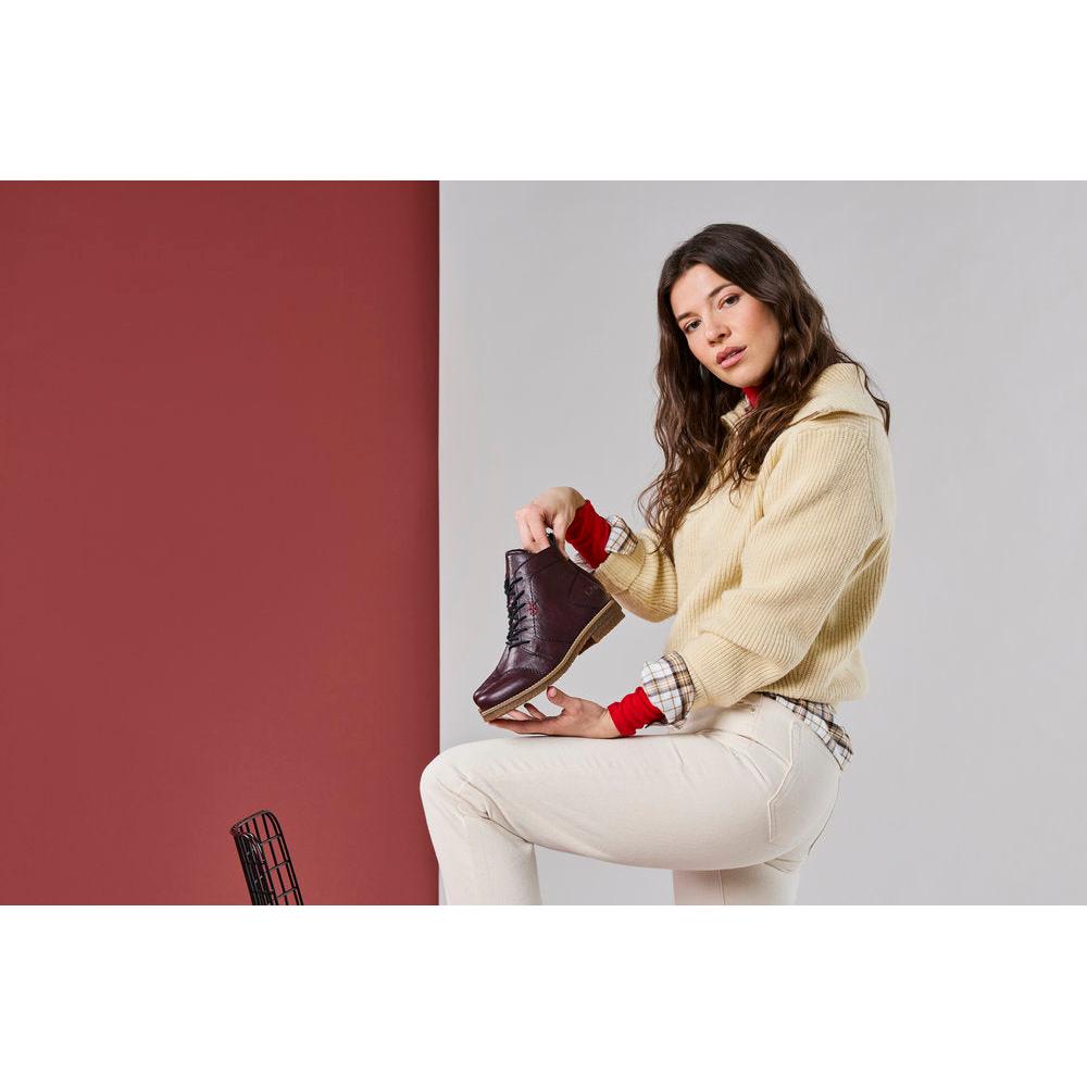 Rieker 73500-30 women's burgundy zip & lace ankle boots, lifestyle view 1 of 7.