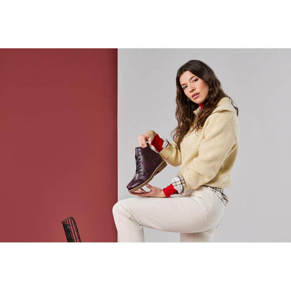 Rieker 73500-30 women's burgundy zip & lace ankle boots, lifestyle view 1 of 7.