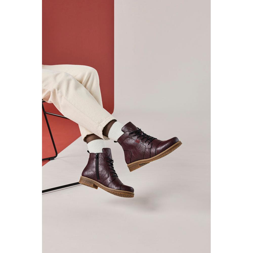 Rieker 73500-30 women's burgundy zip & lace ankle boots, lifestyle view 6 of 7.