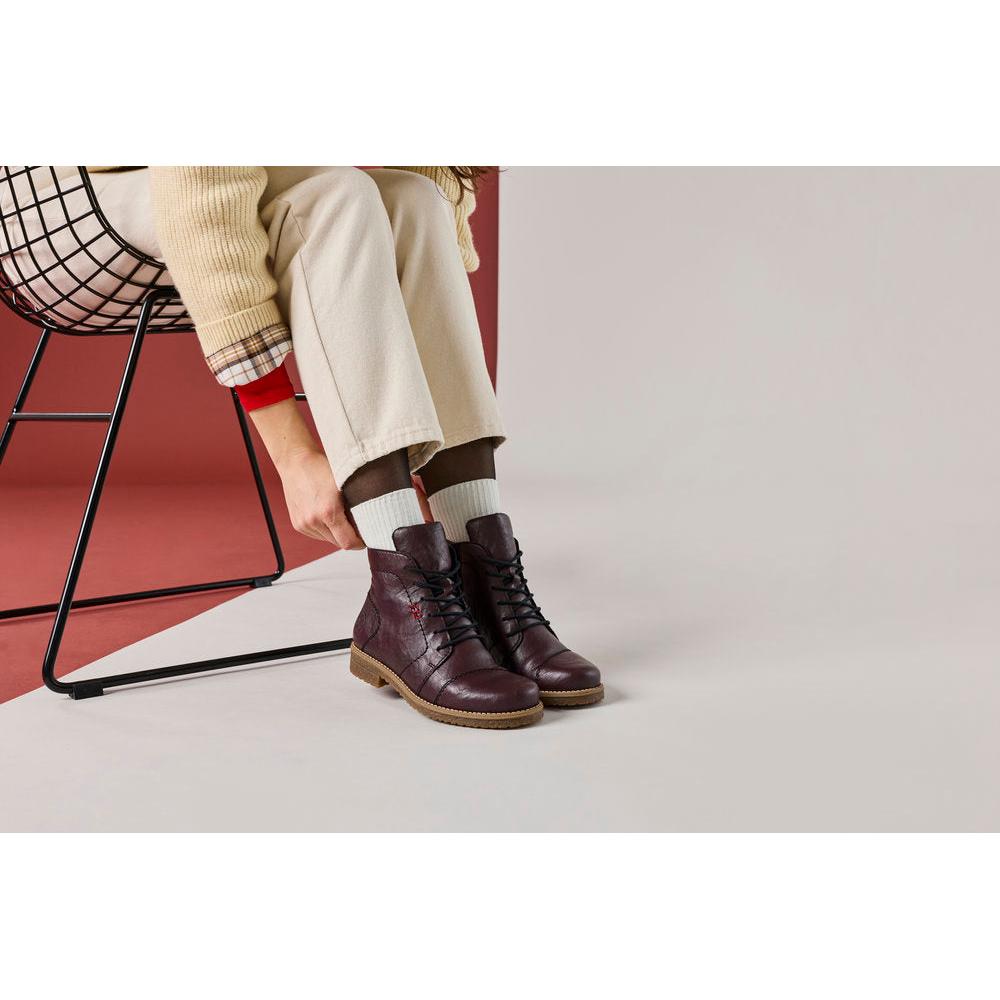Rieker 73500-30 women's burgundy zip & lace ankle boots, lifestyle view 7 of 7.