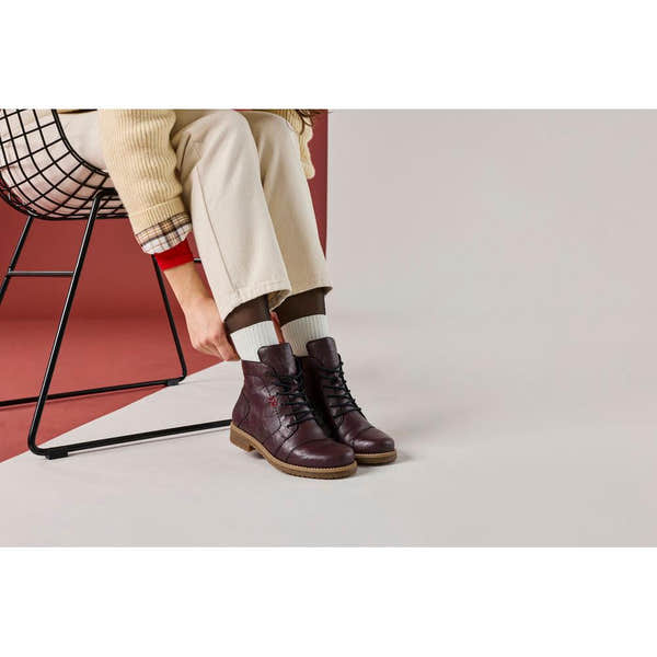 Rieker 73500-30 women's burgundy zip & lace ankle boots, lifestyle view 7 of 7.