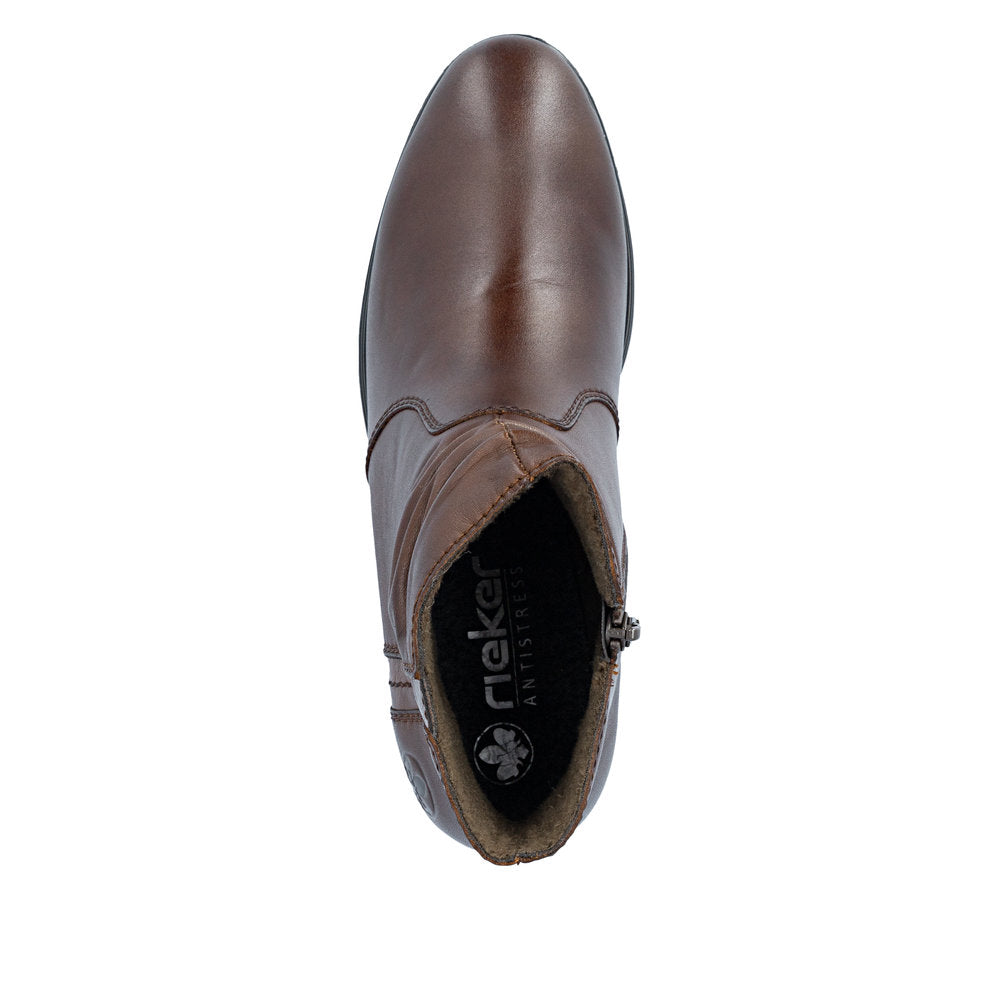 Rieker 73953-27 women's brown leather side zip ankle boots, top view.