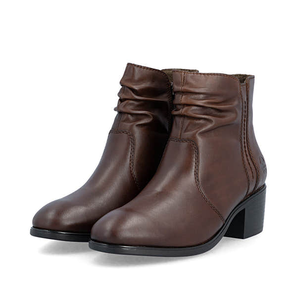 Rieker 73953-27 women's brown leather side zip ankle boots, paired three-quarter view.