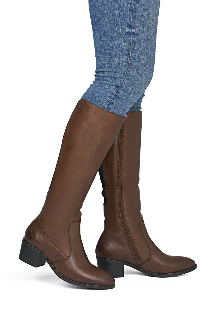 Rieker 73955-22 women's brown leather side zip mid-calf boots, on-foot lifestyle view.