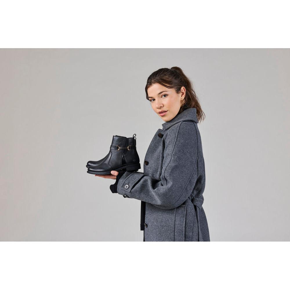 Rieker 74856-00 women's wide black leather side zip ankle boots, lifestyle view 2 of 7.