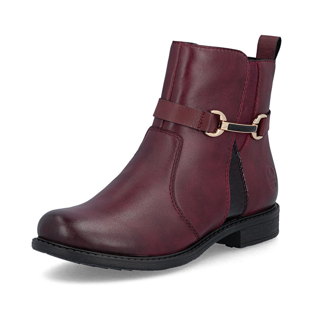Rieker 74856-35 women's wide bordeaux leather side zip ankle boots, front three-quarter view.