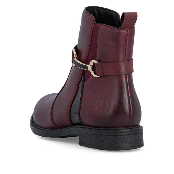 Rieker 74856-35 women's wide bordeaux leather side zip ankle boots, rear three-quarter view.