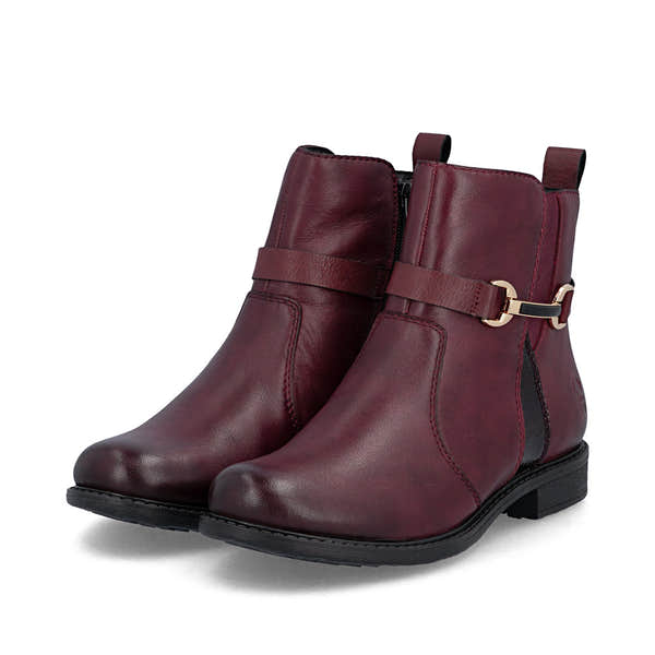 Rieker 74856-35 women's wide bordeaux leather side zip ankle boots, paired three-quarter view.