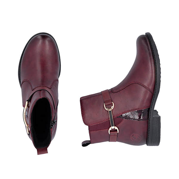 Rieker 74856-35 women's wide bordeaux leather side zip ankle boots, two-angle product view.