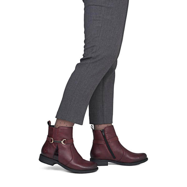 Rieker 74856-35 women's wide bordeaux leather side zip ankle boots, on-foot lifestyle view.