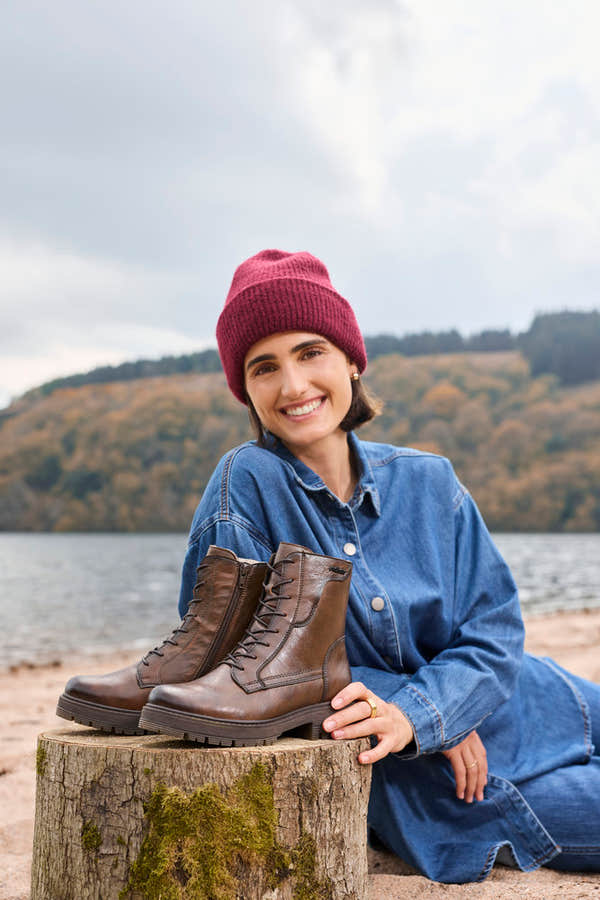 Rieker 75800-25 women's wide brown leather zip & lace ankle boots, lifestyle view 1 of 5.