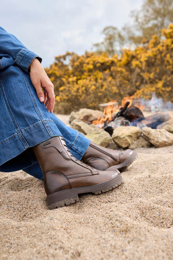 Rieker 75800-25 women's wide brown leather zip & lace ankle boots, lifestyle view 4 of 5.