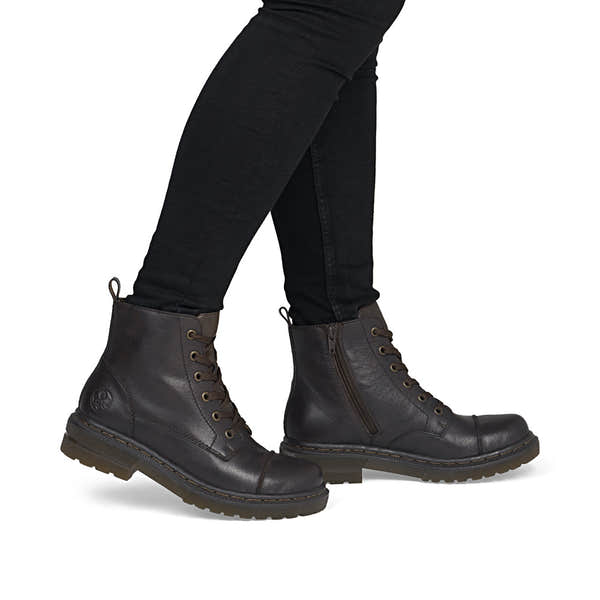 Rieker 78202-25 women's brown leather zip & lace ankle boots, on-foot lifestyle view.