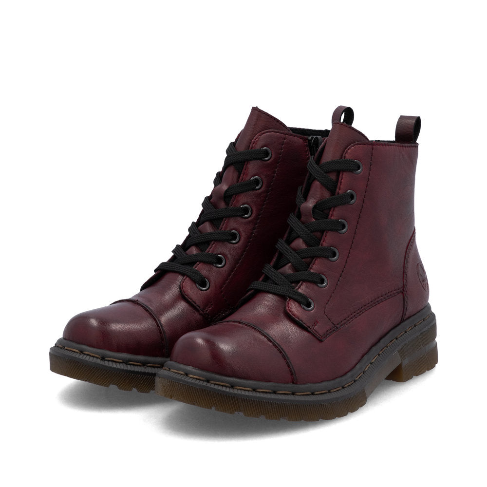 Rieker 78202-35 women's wine leather zip & lace ankle boots, paired three-quarter view.