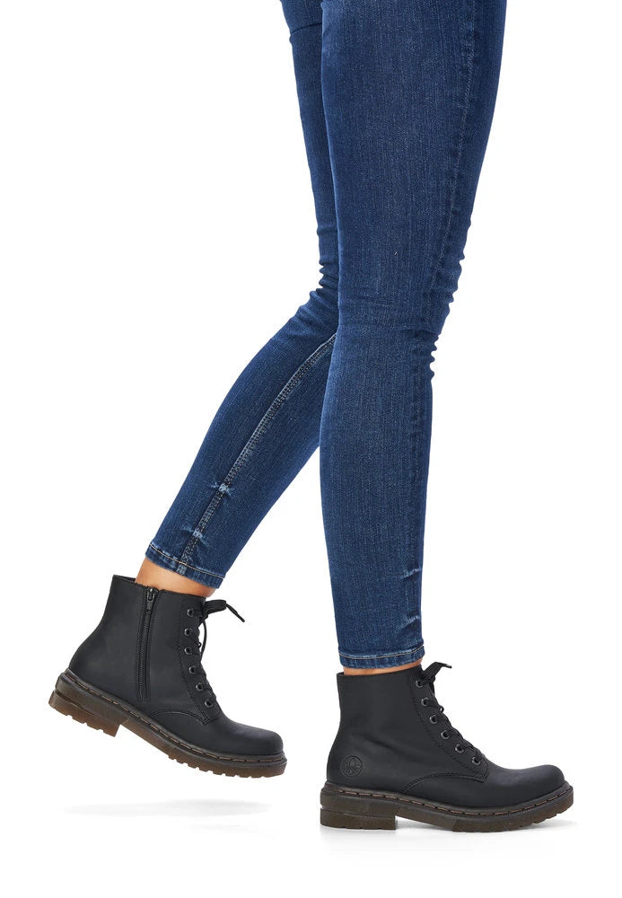 Rieker 78240-00 women's black zip & lace ankle boots, on-foot lifestyle view.