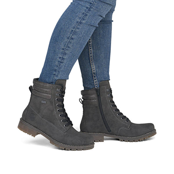 Rieker 79525-45 women's grey water resistant zip & lace ankle boots, on-foot lifestyle view.