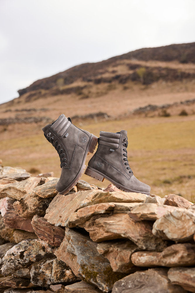 Rieker 79525-45 women's grey water resistant zip & lace ankle boots, lifestyle view 2 of 2.
