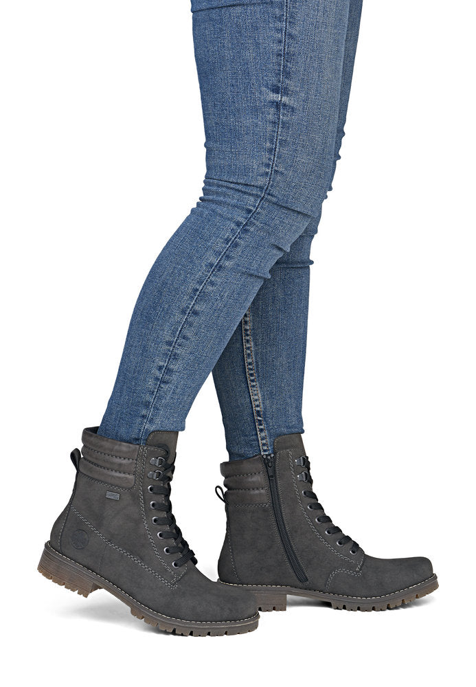 Rieker 79525-45 women's grey water resistant zip & lace ankle boots, on-foot lifestyle view.