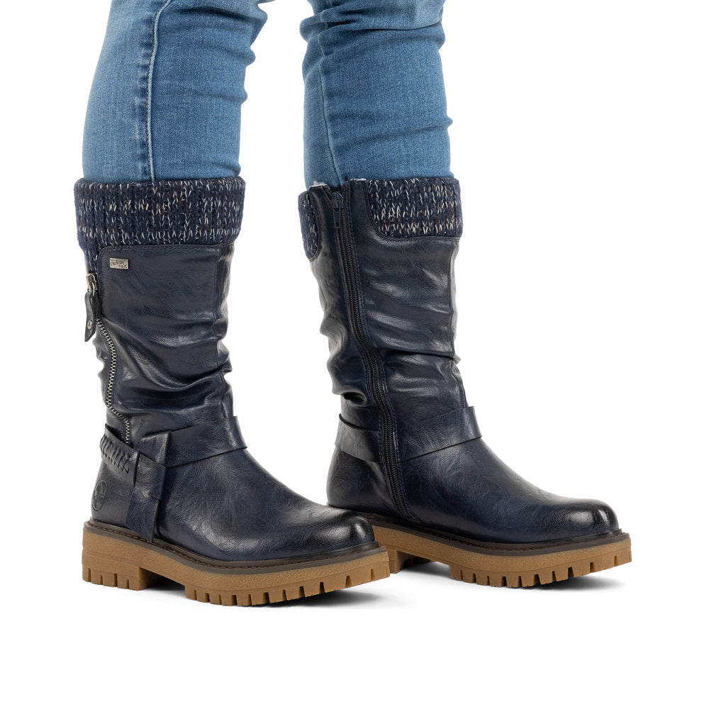 Rieker 92984-14 women's wide navy water resistant side zip mid-calf boots, on-foot lifestyle view.