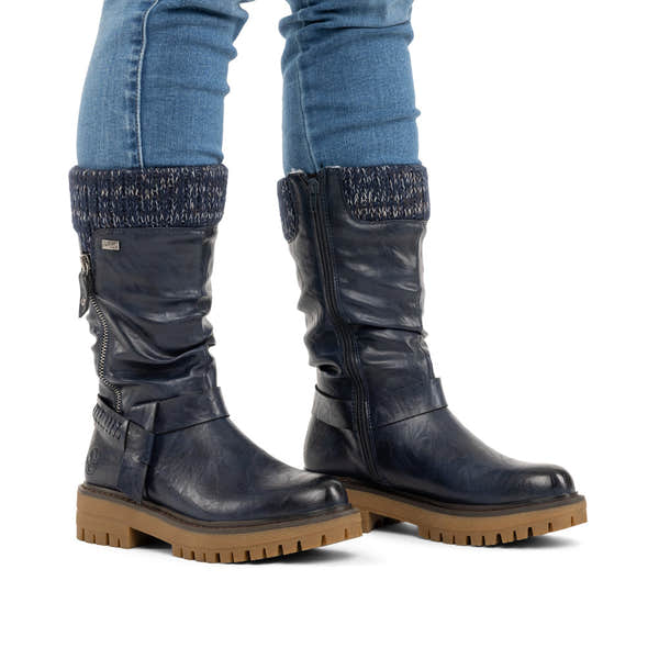 Rieker 92984-14 women's wide navy water resistant side zip mid-calf boots, on-foot lifestyle view.