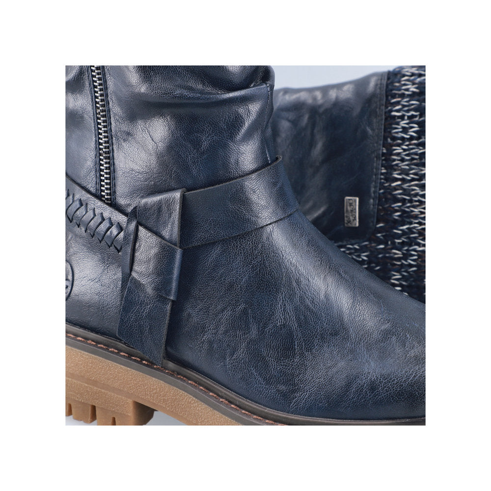 Rieker 92984-14 women's wide navy water resistant side zip mid-calf boots, lifestyle view.