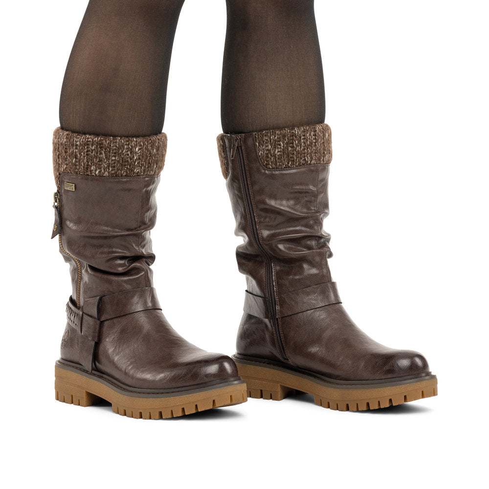 Rieker 92984-25 women's wide brown water resistant side zip mid-calf boots, on-foot lifestyle view.