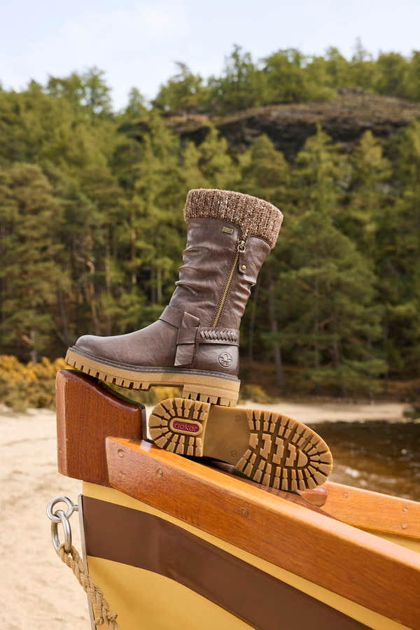 Rieker 92984-25 women's wide brown water resistant side zip mid-calf boots, lifestyle view 1 of 3.