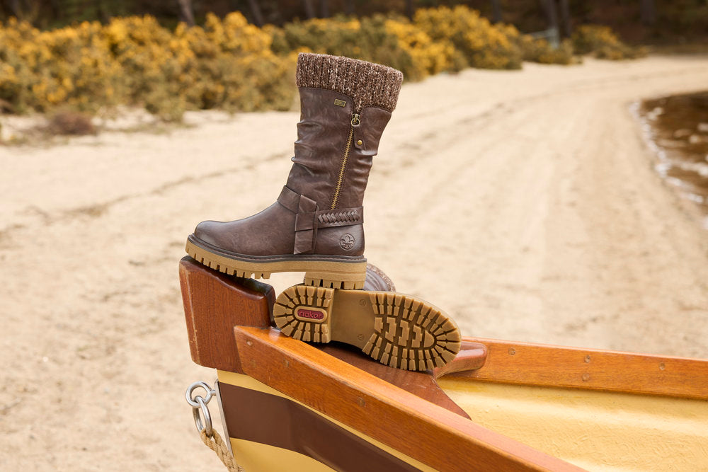 Rieker 92984-25 women's wide brown water resistant side zip mid-calf boots, lifestyle view 2 of 3.