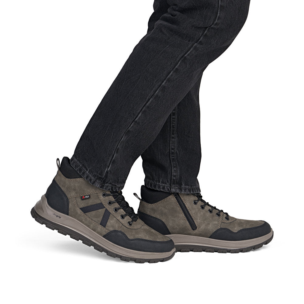 Rieker B8120-25 men's wide grey water resistant zip & lace ankle boots, on-foot lifestyle view.