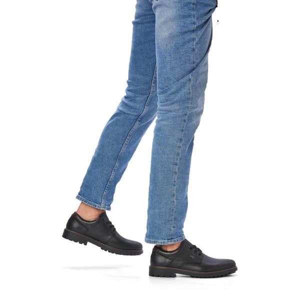 Rieker F4611-00 men's black leather water resistant lace up shoes, on-foot lifestyle view.