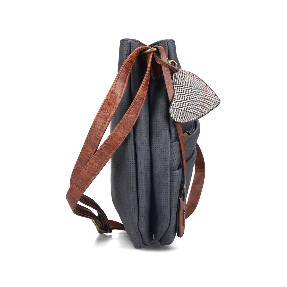 Rieker H1005-14 women's navy handbag with cross over tan strap, top view.