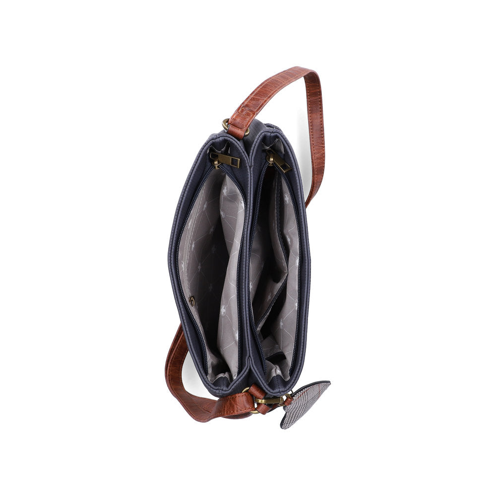Rieker H1005-14 women's navy handbag with cross over tan strap, inner side view.
