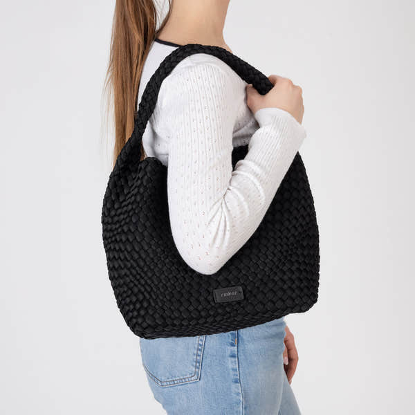 Rieker H1044-00 Black Woven Handbag with Matching Pouch, lifestyle view 8 of 14.