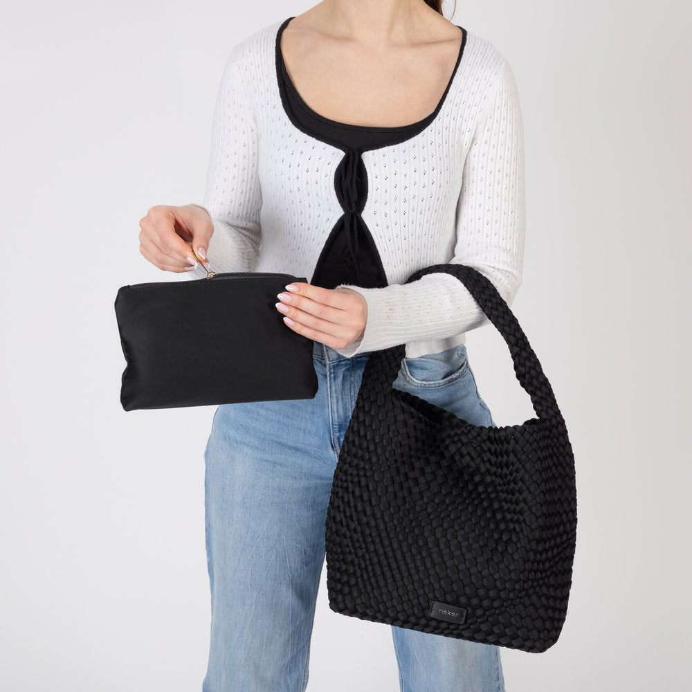 Rieker H1044-00 Black Woven Handbag with Matching Pouch, lifestyle view 14 of 14.