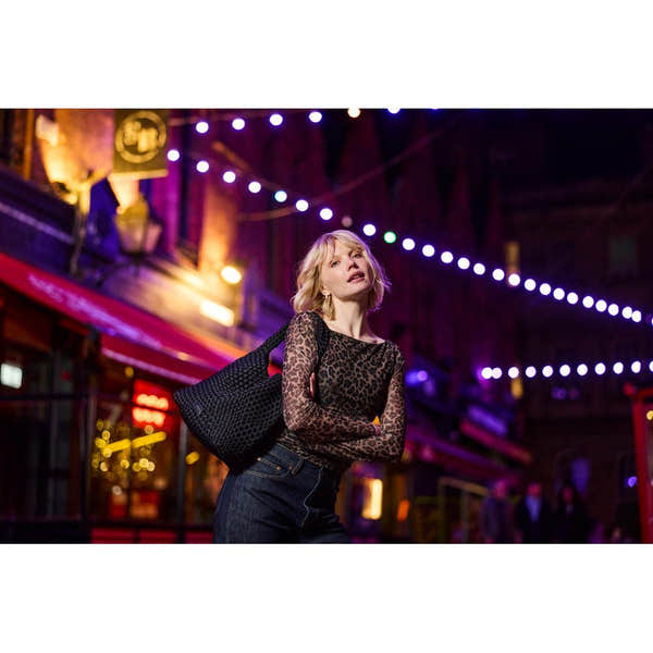 Rieker H1044-00 Black Woven Handbag with Matching Pouch, lifestyle view 3 of 14.