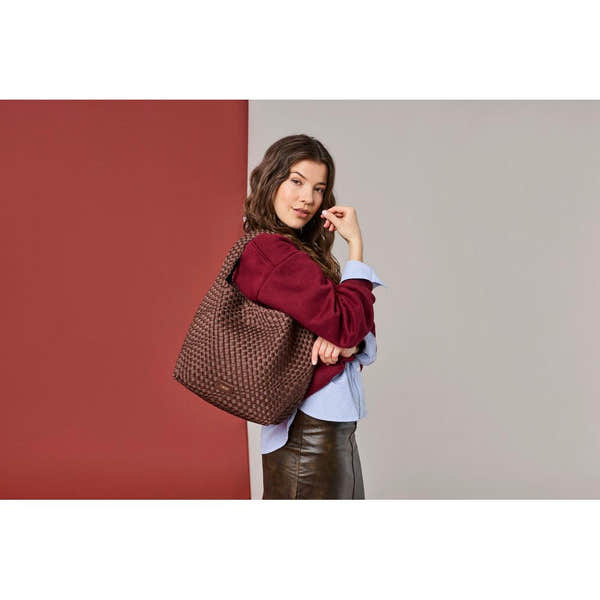 Rieker H1044-25 Brown Woven Handbag with Matching Pouch, lifestyle view 1 of 8.