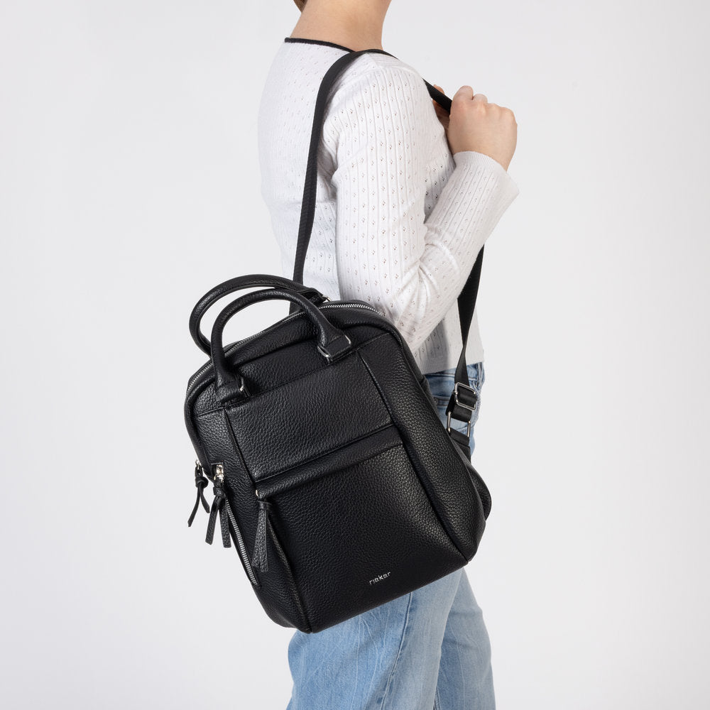 Rieker H1050-00 Black Backpack, lifestyle view 9 of 9.