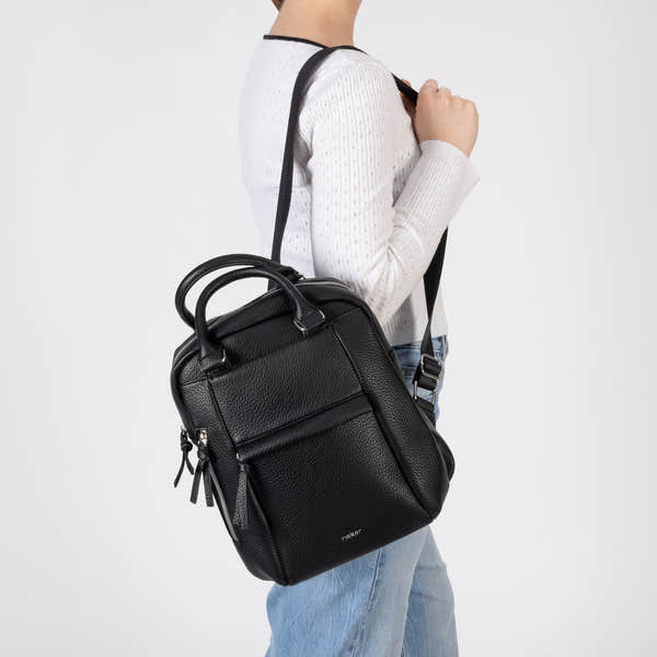 Rieker H1050-00 Black Backpack, lifestyle view 9 of 9.