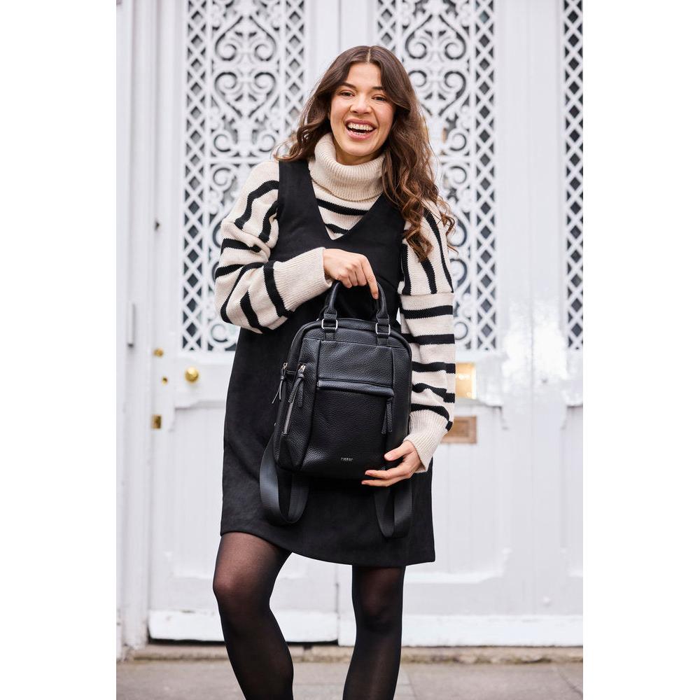 Rieker H1050-00 Black Backpack, lifestyle view 3 of 9.
